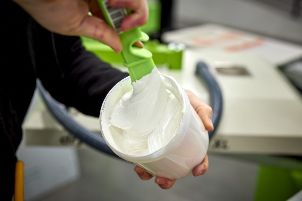 Puff being mixed into white ink